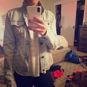 Distressed denim jacket